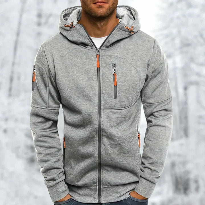 "Herren Kapuzenjacke mit Reißverschluss, in vielseitigen Farben, modernem Design, ideal für stilvolle, funktionale Outfits."
