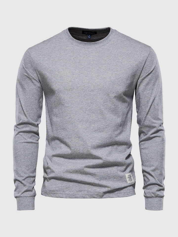 "Herren Langarmshirt aus Baumwolle, rundhals, weiche Textur, lässig, langlebig, ideal für Freizeit und Büro."