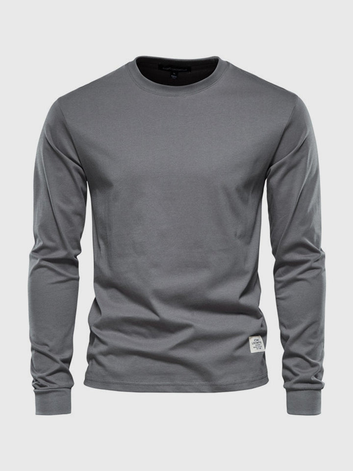 "Herren Langarmshirt aus Baumwolle, rundhals, weiche Textur, lässig, langlebig, ideal für Freizeit und Büro."