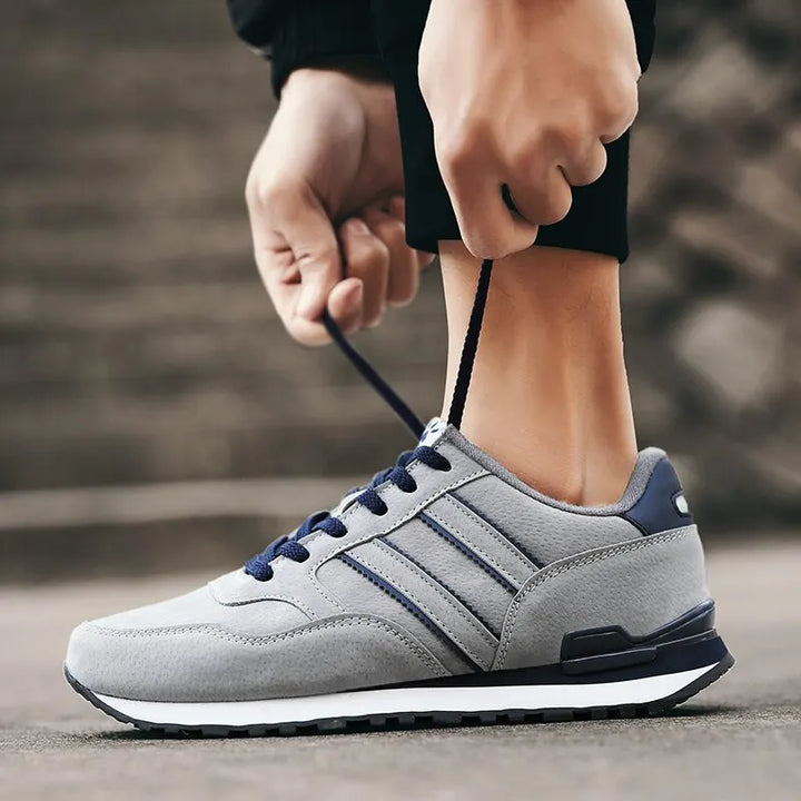 "Herren-Sneaker mit atmungsaktivem Design, Schnürverschluss und modischem Muster, ideal für Frühling und Herbst."