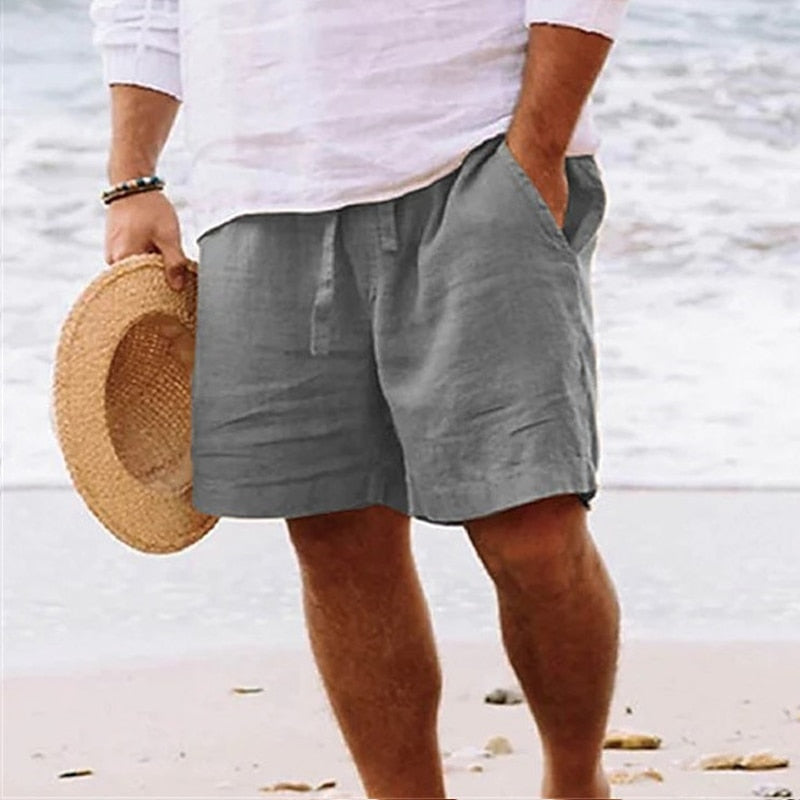 "Herren Sommer Shorts, leichtes Material, bequemer Schnitt, beige, ideal für Strand und Freizeit, mit Taschen und Kordelzug."