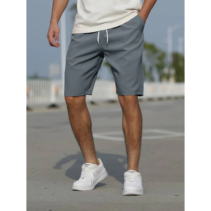 "Herren Sommershorts, atmungsaktiv, locker geschnitten; ideal für Freizeit. Perfekt für warme Tage, mit praktischen Taschen."