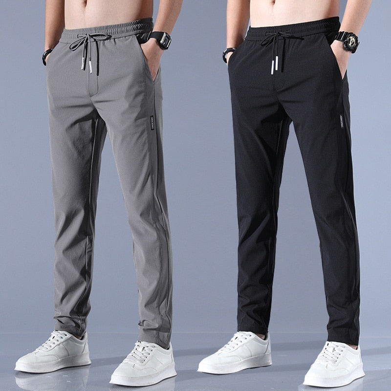 "Herren-Stretchhose, atmungsaktiv, schnelltrocknend, elastisch, vielseitig, grau, moderne Passform, ideal für Sport und Allta
