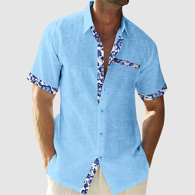 Herrenhemd mit tropischem Muster, kurzes Design, lässig-elegant, ideal für Sommer und Freizeit, angenehmes Tragegefühl.