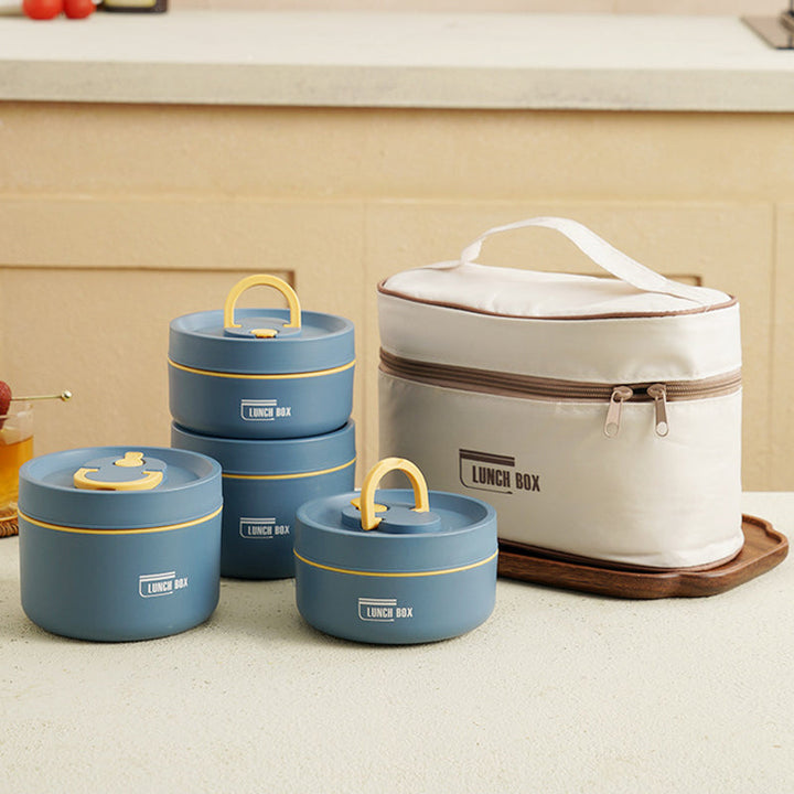"Isolierte mehrschichtige Lunchbox aus Edelstahl, rund gestapelt und vorne abgebildet, ideal für warme Speisen unterwegs."