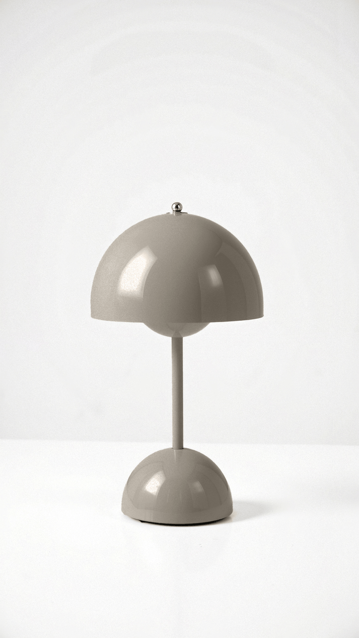"Kabellose Veluce Tischlampe in verschiedenen Farben, modernes Design, schafft gemütliches, warmes Lichtambiente."