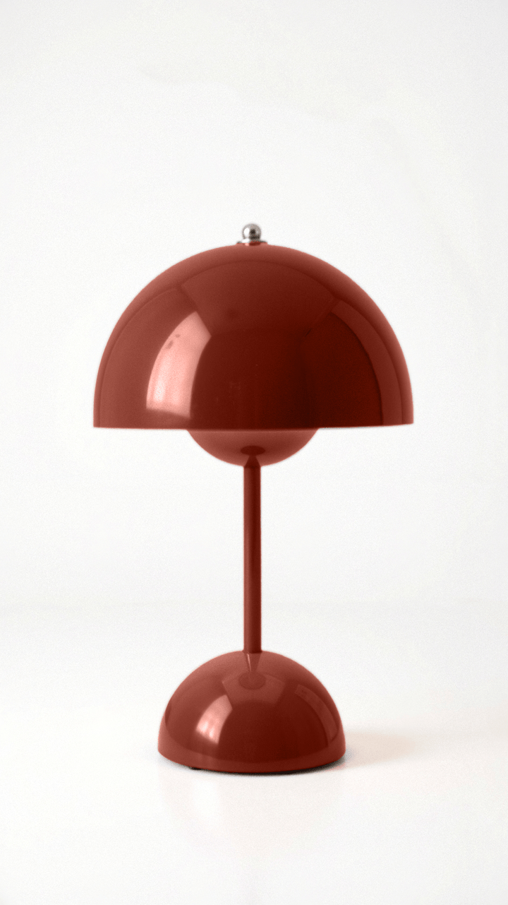 "Kabellose Veluce Tischlampe in verschiedenen Farben, modernes Design, schafft gemütliches, warmes Lichtambiente."