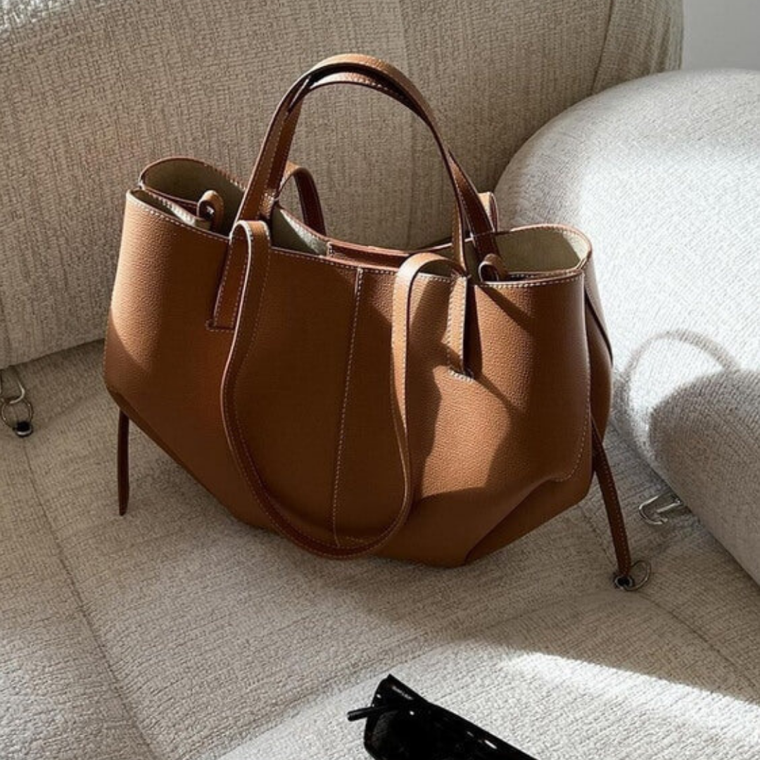 "Klassische Damen-Umhängetasche im Vintage-Stil, elegant, geräumig, ideal für Alltag und Reisen, in Braun, Schwarz, Taupe."