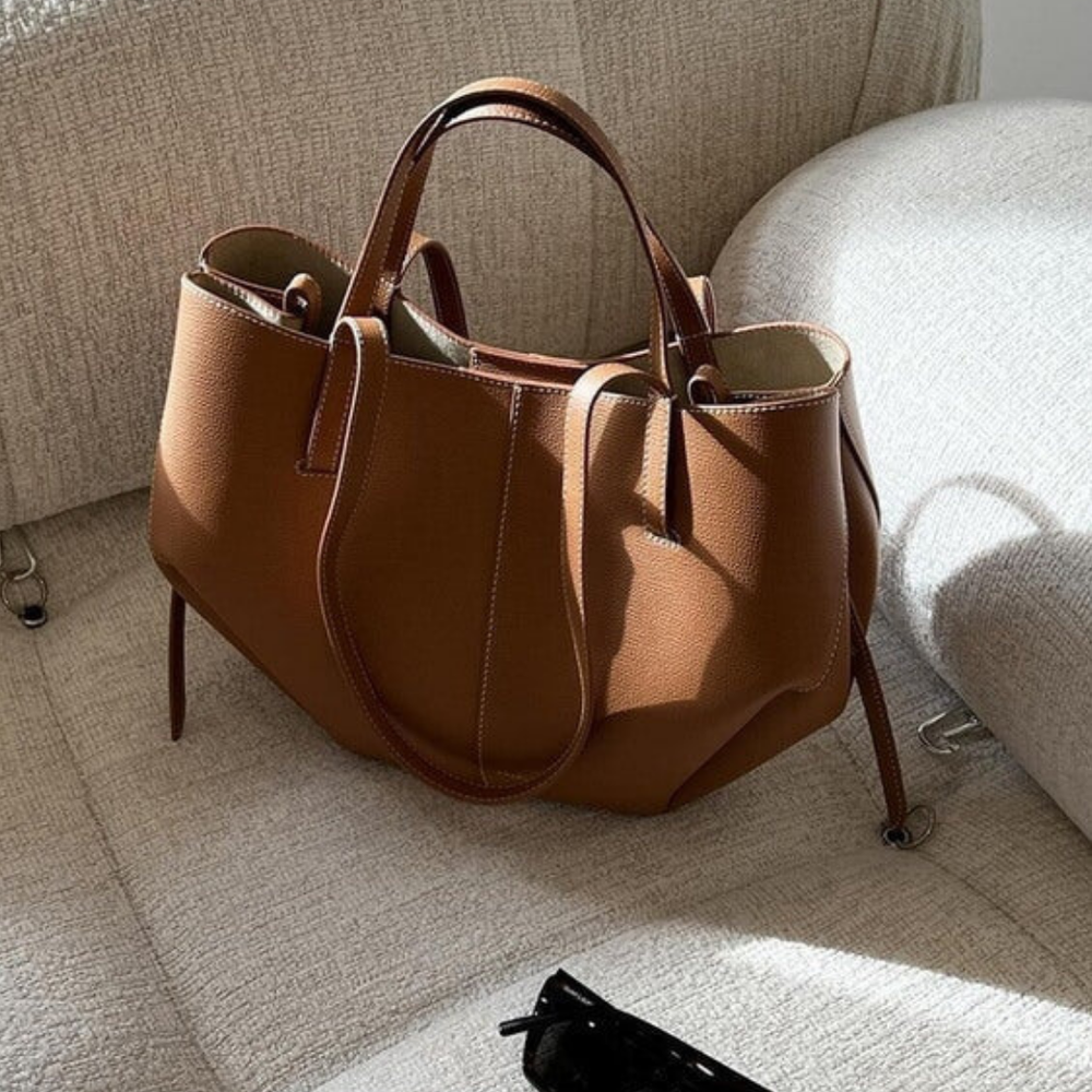 "Klassische Damen-Umhängetasche im Vintage-Stil, elegant, geräumig, ideal für Alltag und Reisen, in Braun, Schwarz, Taupe."