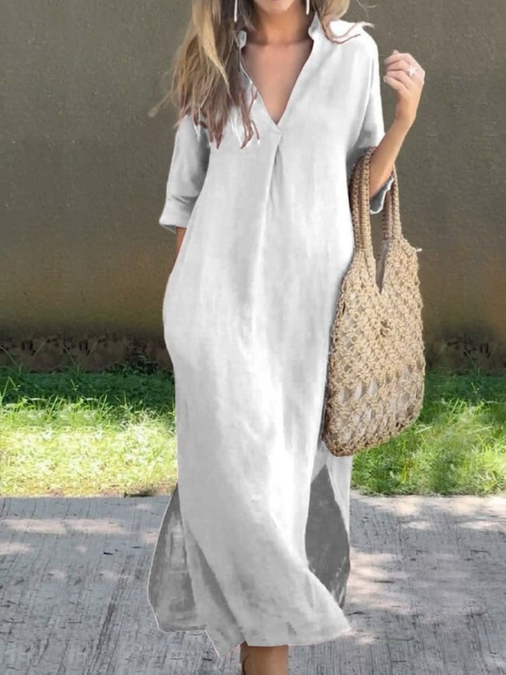 Klassisches Damen Sommerkleid in Midi-Länge mit V-Ausschnitt, fließender Silhouette und femininer Passform für sommerliche El