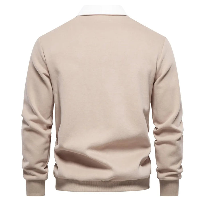 "Klassisches Rugby-Poloshirt für Herren, marineblau mit weißem Kragen, aus Baumwollmischung, sportlich-elegant."