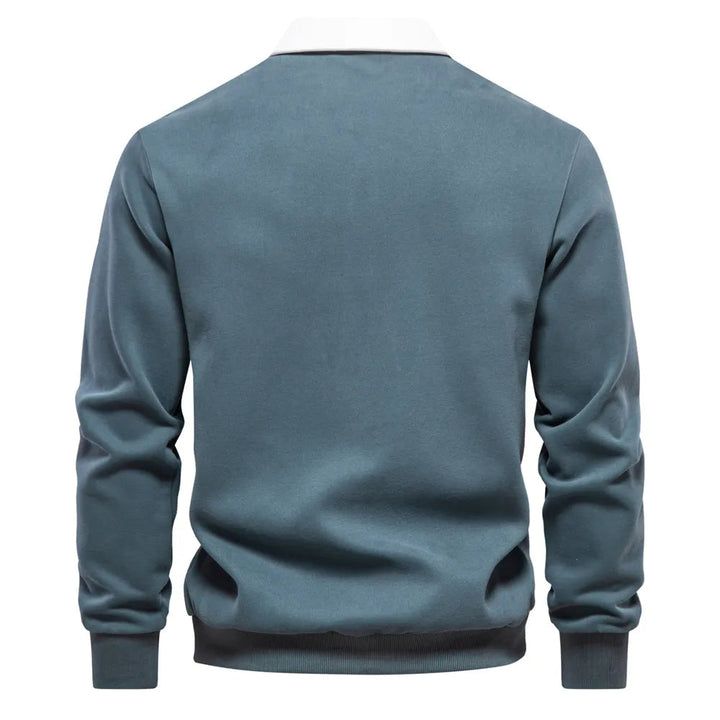 "Klassisches Rugby-Poloshirt für Herren, marineblau mit weißem Kragen, aus Baumwollmischung, sportlich-elegant."