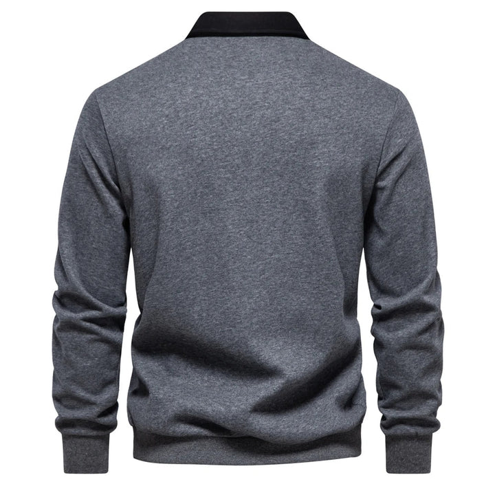"Klassisches Rugby-Poloshirt für Herren, marineblau mit weißem Kragen, aus Baumwollmischung, sportlich-elegant."