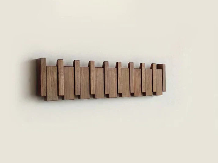 Klaviergarderobe aus Holz, kunstvoller Haken mit elegantem Design, ideal für Flur oder Büro, vielseitig und stilvoll.