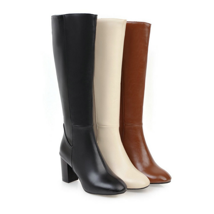 Kniehohe Damenstiefel mit Reißverschluss, elegant und bequem, in hochwertigem Material für stilvolle, kühle Tage.