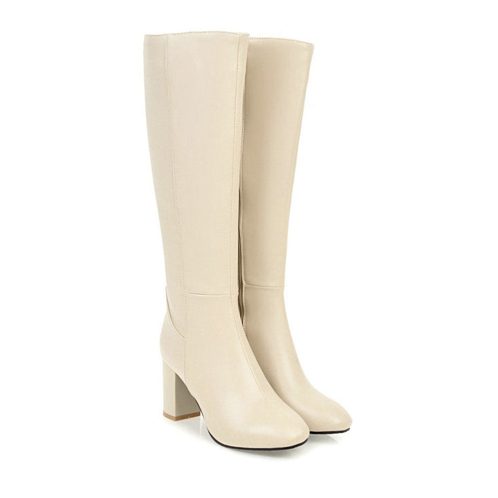 Kniehohe Damenstiefel mit Reißverschluss, elegant und bequem, in hochwertigem Material für stilvolle, kühle Tage.