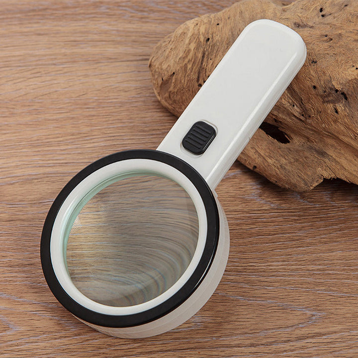 "Kompakte 30-fache optische Lupe mit LED-Licht, klare Linien, ideal für Detailbetrachtung und verbessertes Sehvermögen."