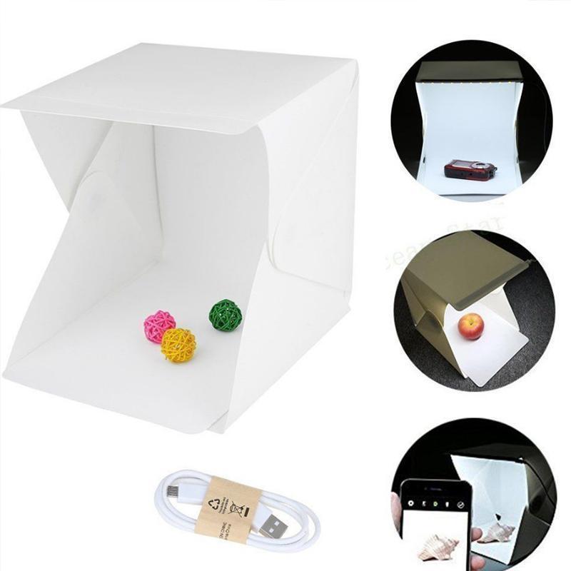 "Kompakte Foto-Studio-Lichtbox mit LED-Licht, weißem Hintergrund und Tragetasche für hochwertige Heim-Fotografie"