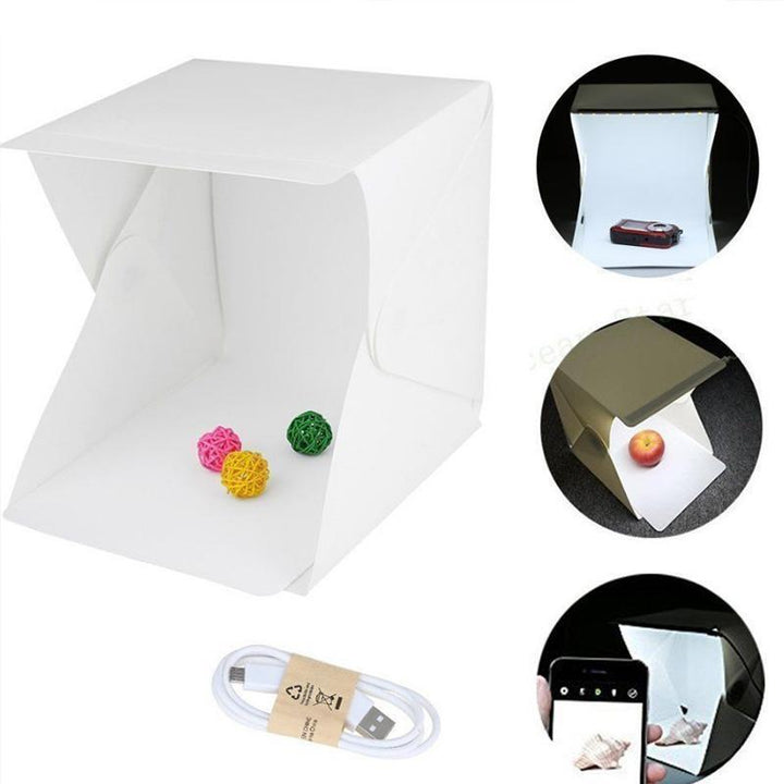 "Kompakte Foto-Studio-Lichtbox mit LED-Licht, weißem Hintergrund und Tragetasche für hochwertige Heim-Fotografie"