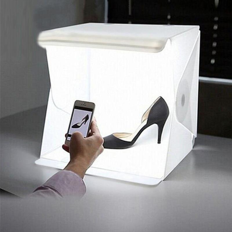 "Kompakte Foto-Studio-Lichtbox mit LED-Licht, weißem Hintergrund und Tragetasche für hochwertige Heim-Fotografie"