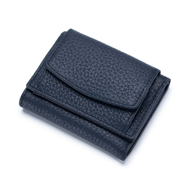 "Kompakte RFID-Leder-Geldbörse in Schwarz, bietet Datenschutz und vielseitigen Stauraum, perfekt für Damenhandtaschen."