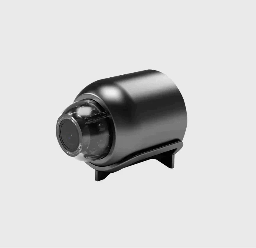 "Kompakte WiFi-Überwachungskamera mit Nachtsicht, Weitwinkelobjektiv und HD-Videoqualität für Innenräume."