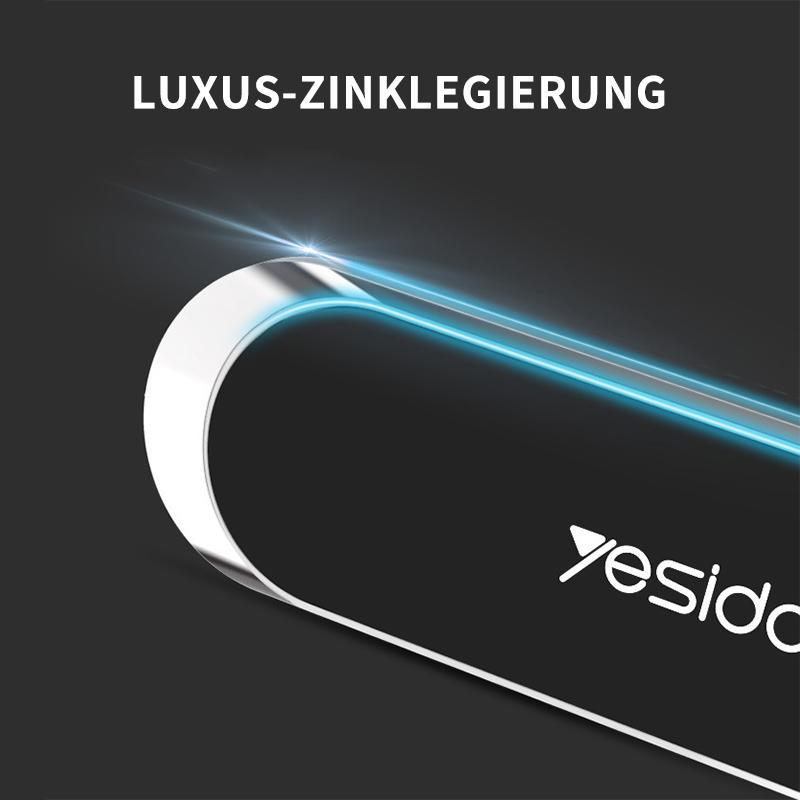 "Kompakter magnetischer Telefonhalter an Armaturenbrett, montagefrei, starke Magnetkraft für sicheres Smartphone-Halten."