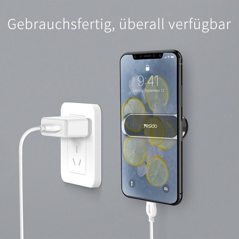 "Kompakter magnetischer Telefonhalter an Armaturenbrett, montagefrei, starke Magnetkraft für sicheres Smartphone-Halten."
