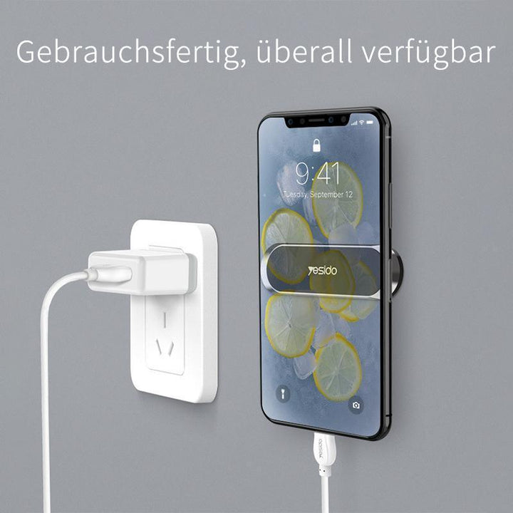 "Kompakter magnetischer Telefonhalter an Armaturenbrett, montagefrei, starke Magnetkraft für sicheres Smartphone-Halten."