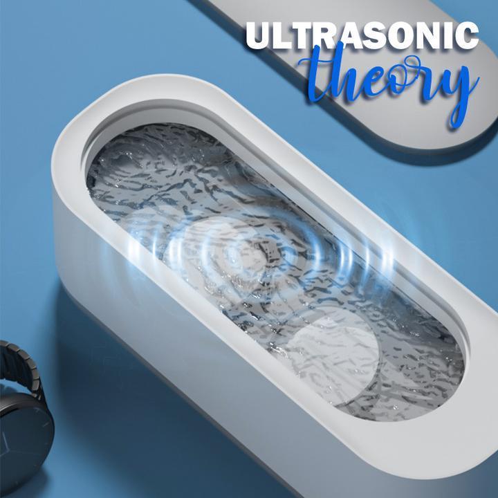 "Kompaktes Ultraschall-Reinigungsgerät in Weiß und Grau für Schmuck, Brillen, Uhren; effiziente 360°-Tiefenreinigung."