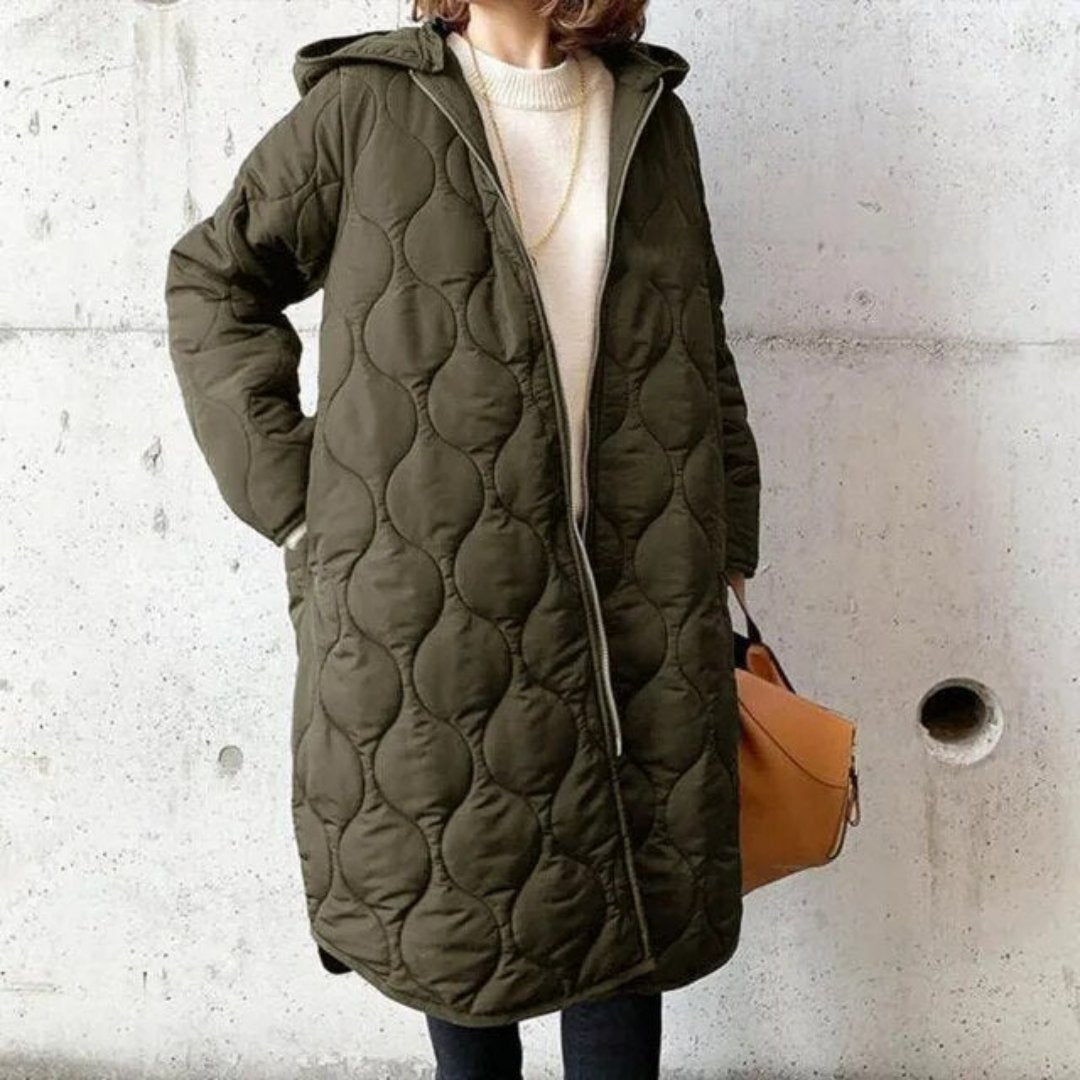 Lange Damen-Steppjacke mit Reißverschluss, elegantes Design, modische Silhouette, ideal für kalte Tage.
