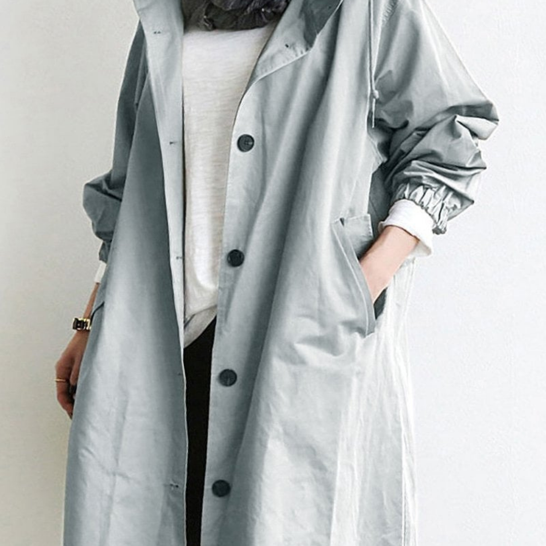 "Langer, eleganter Damen-Trenchcoat, wasserdicht, mit stilvoller Passform in Beige. Ideal für Wintermode und schlechte Wetter
