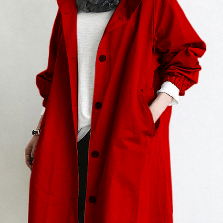 "Langer, eleganter Damen-Trenchcoat, wasserdicht, mit stilvoller Passform in Beige. Ideal für Wintermode und schlechte Wetter