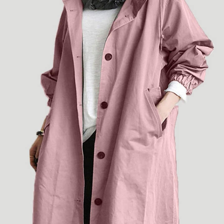 "Langer, eleganter Damen-Trenchcoat, wasserdicht, mit stilvoller Passform in Beige. Ideal für Wintermode und schlechte Wetter