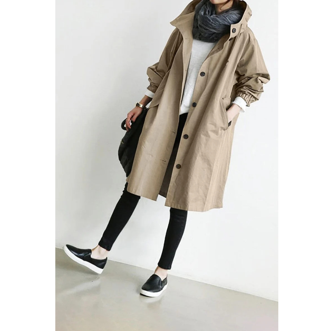 "Langer, eleganter Damen-Trenchcoat, wasserdicht, mit stilvoller Passform in Beige. Ideal für Wintermode und schlechte Wetter