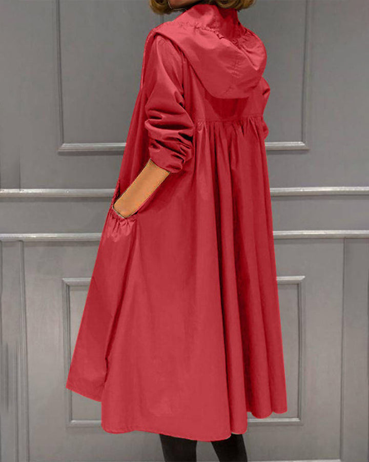 Langer, wasserfester Damen-Trenchcoat mit Kapuze, unifarben, ideal für Herbst/Winter, elegant und funktional.