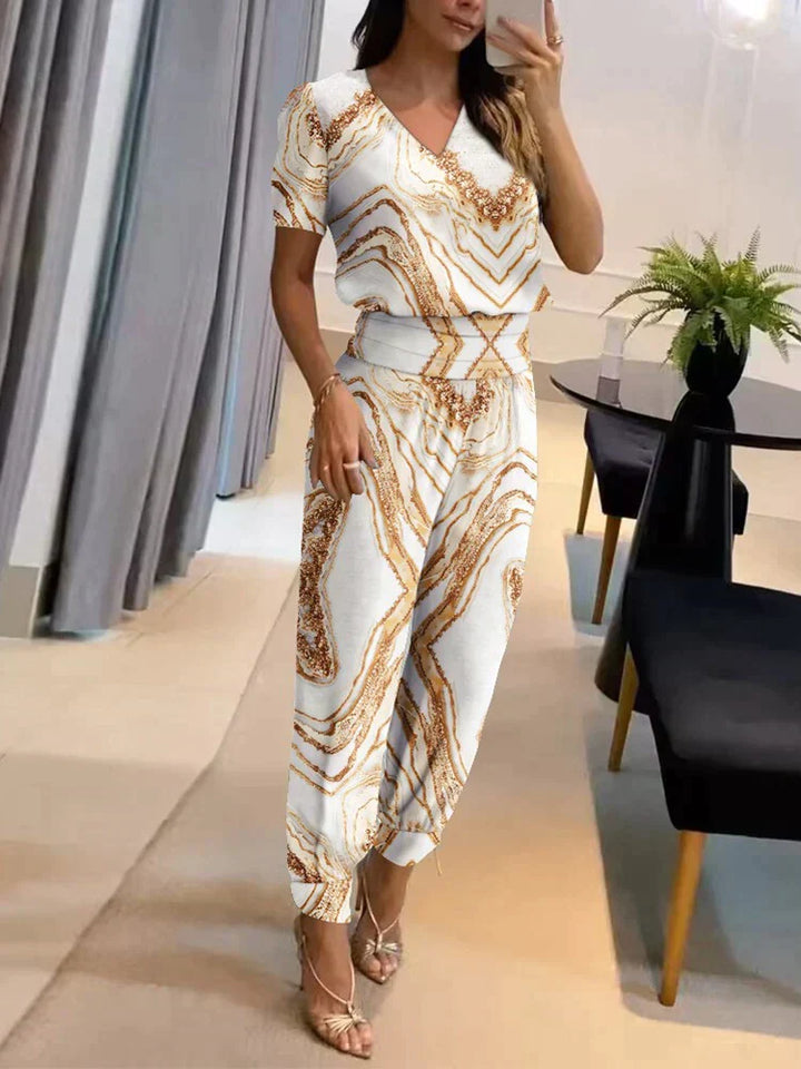 "Lässiges Damen-Set mit Oberteil und Hose in verschiedenen Farben, ideal für Alltag und Anlässe, zeitgemäße Eleganz."