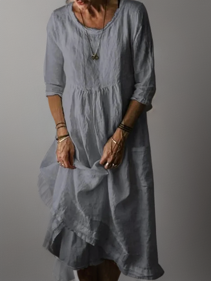 "Lässiges Damen-Sommerkleid mit Rundhalsausschnitt, Midi-Länge, zeitloses Design, ideal für Sommeranlässe."