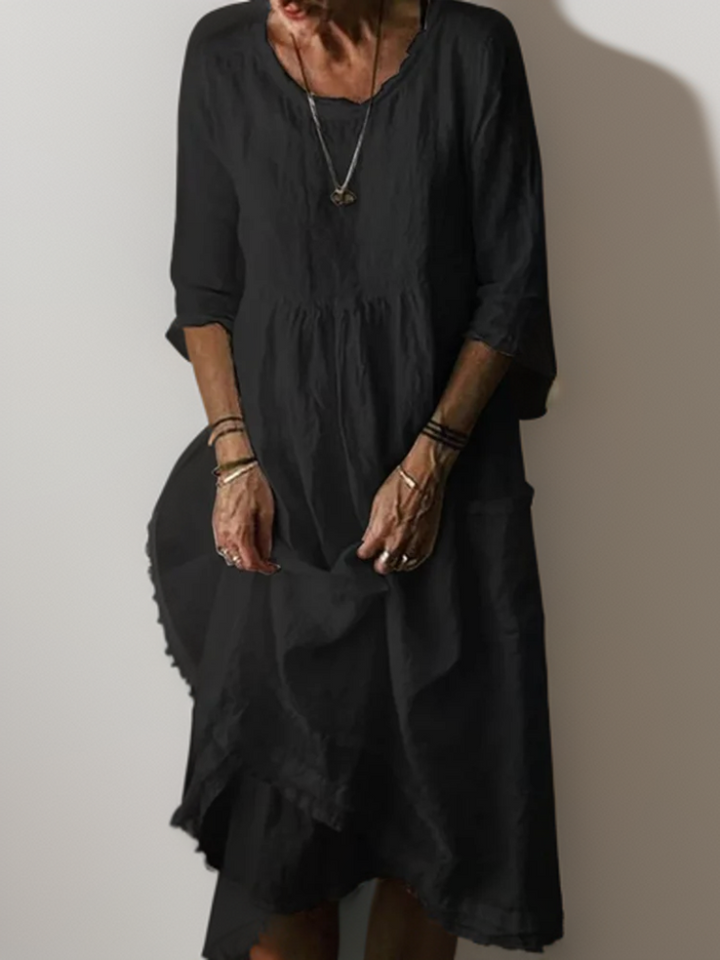 "Lässiges Damen-Sommerkleid mit Rundhalsausschnitt, Midi-Länge, zeitloses Design, ideal für Sommeranlässe."