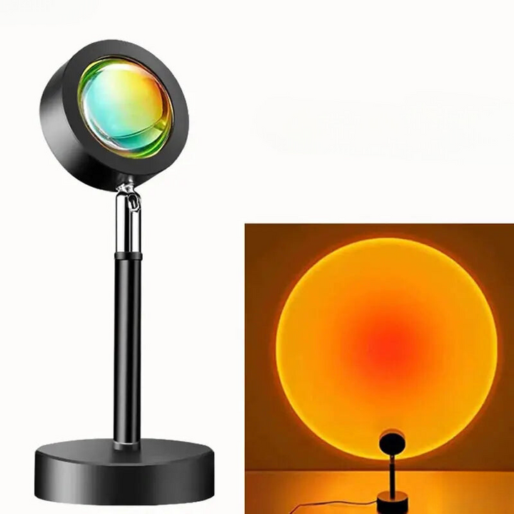 "LED-Projektionslampe mit Sonnenuntergangsfarben, kompakt und modern, schafft stimmungsvolle Beleuchtung auf Tischen"
