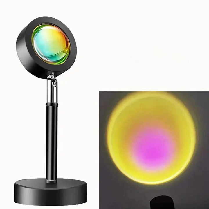 "LED-Projektionslampe mit Sonnenuntergangsfarben, kompakt und modern, schafft stimmungsvolle Beleuchtung auf Tischen"