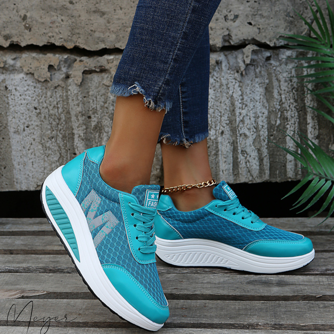 "Leichte, atmungsaktive U-förmige orthopädische Sportschuhe für Damen in modernem Design mit anatomischer Stütze."