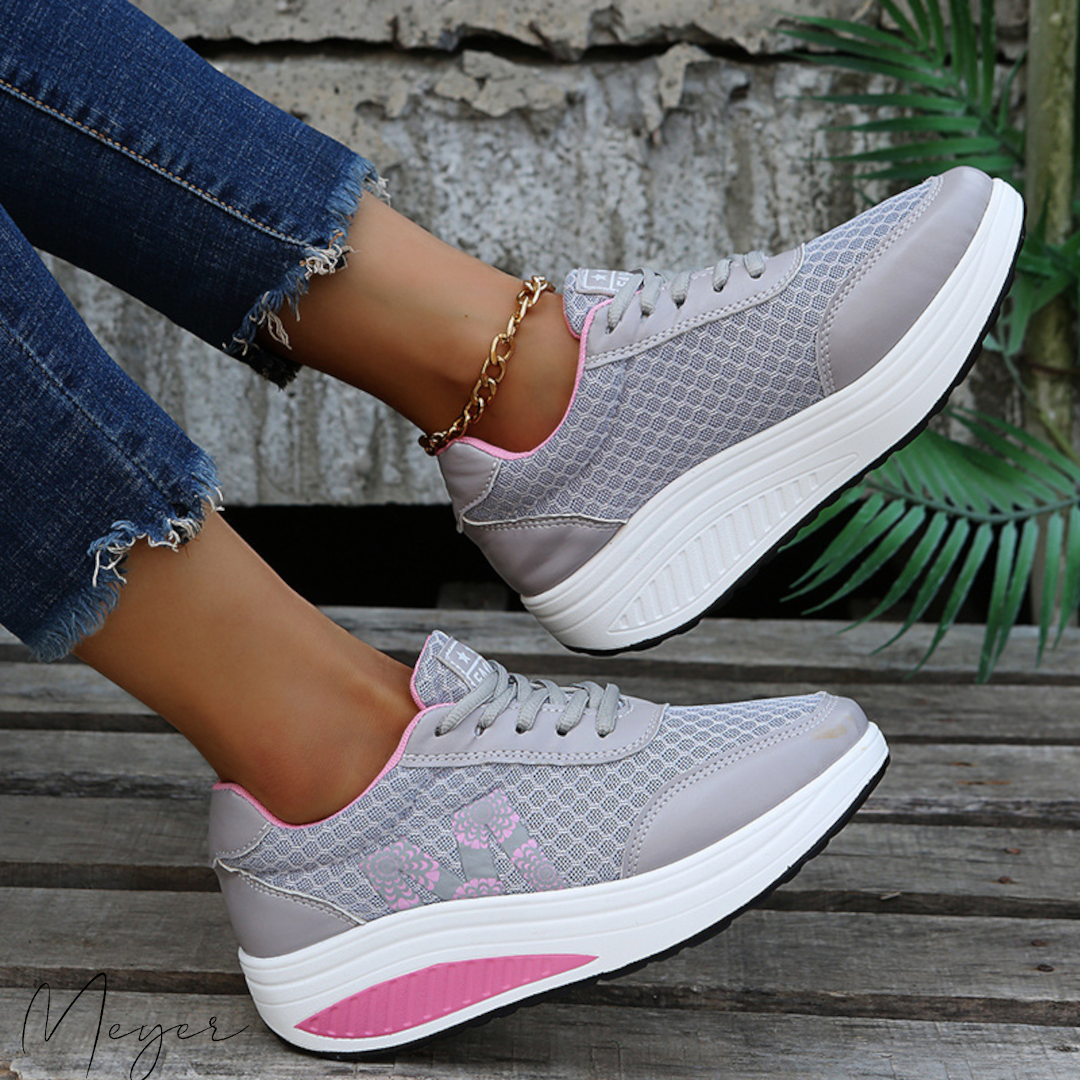 "Leichte, atmungsaktive U-förmige orthopädische Sportschuhe für Damen in modernem Design mit anatomischer Stütze."