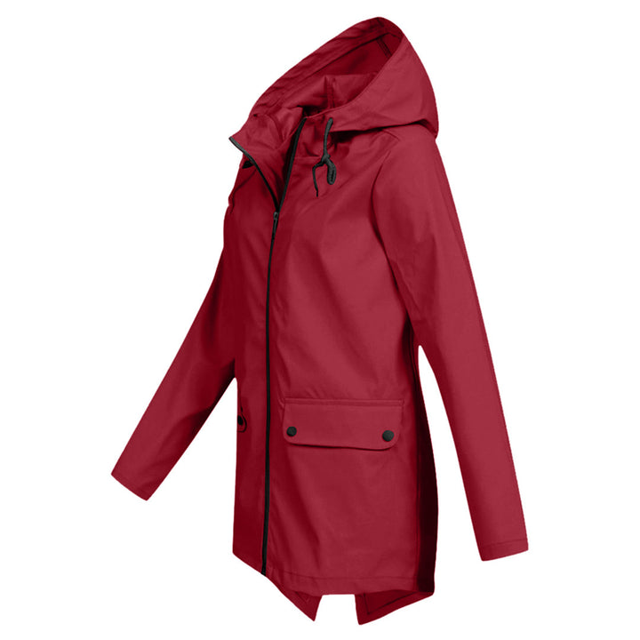 Leichte Damen Regenjacke in Apricot, wasserfest, stilvoll, hält trocken bei Regenwetter, eleganter Schnitt ideal für Alltag.