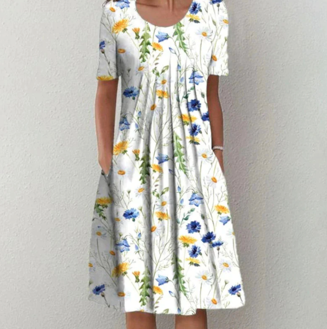 "Leichtes Damen Sommerkleid mit lebhaften Drucken, Midi-Länge, ideal für warme Tage und modische Auftritte."