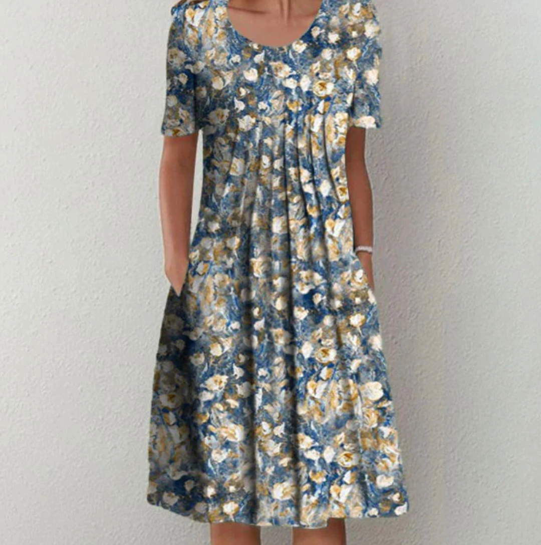 "Leichtes Damen Sommerkleid mit lebhaften Drucken, Midi-Länge, ideal für warme Tage und modische Auftritte."