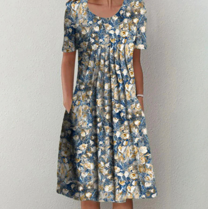 "Leichtes Damen Sommerkleid mit lebhaften Drucken, Midi-Länge, ideal für warme Tage und modische Auftritte."