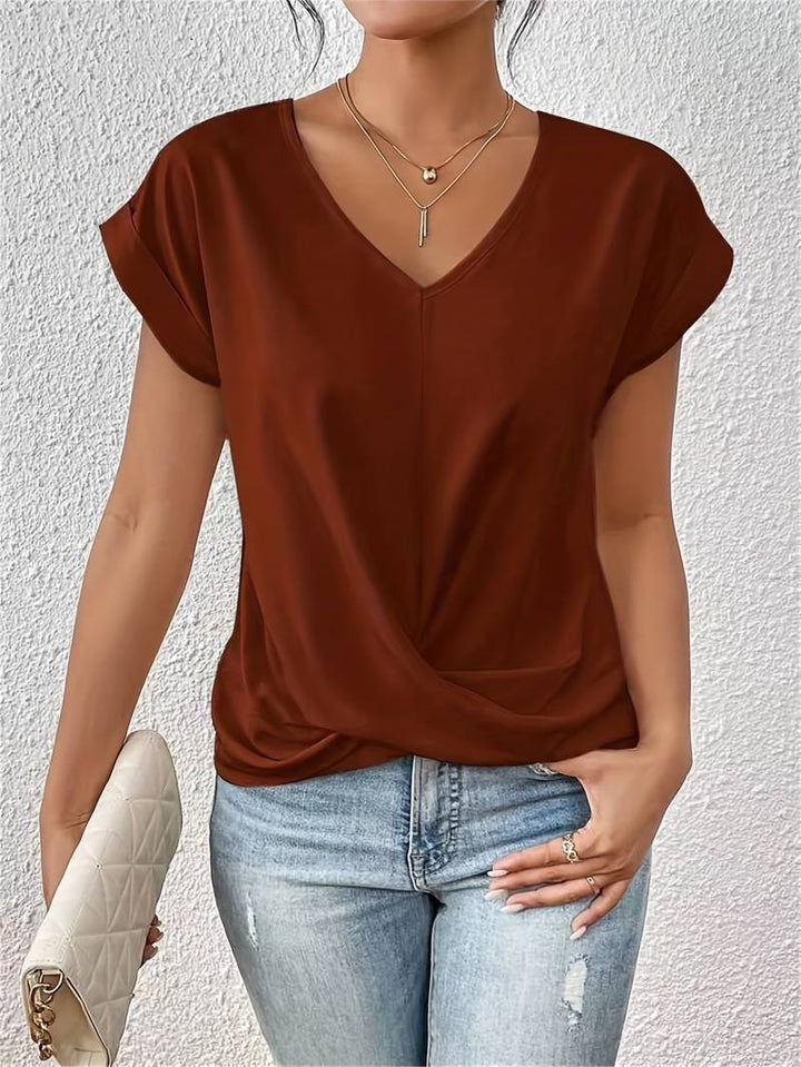 Leichtes Damenshirt mit V-Ausschnitt und Verdrehung-Detail, lässige Passform, ideal für vielseitige Outfits bei jedem Anlass.