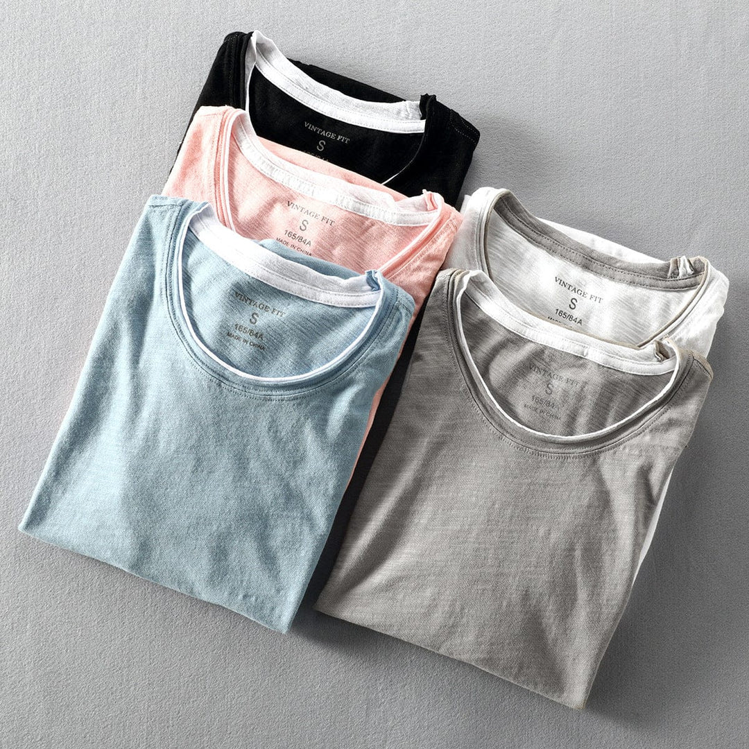 Leichtes Herren T-Shirt in Weiß, weiches Material, kurze Ärmel, perfekt für Sommermode und vielseitige Anlässe.