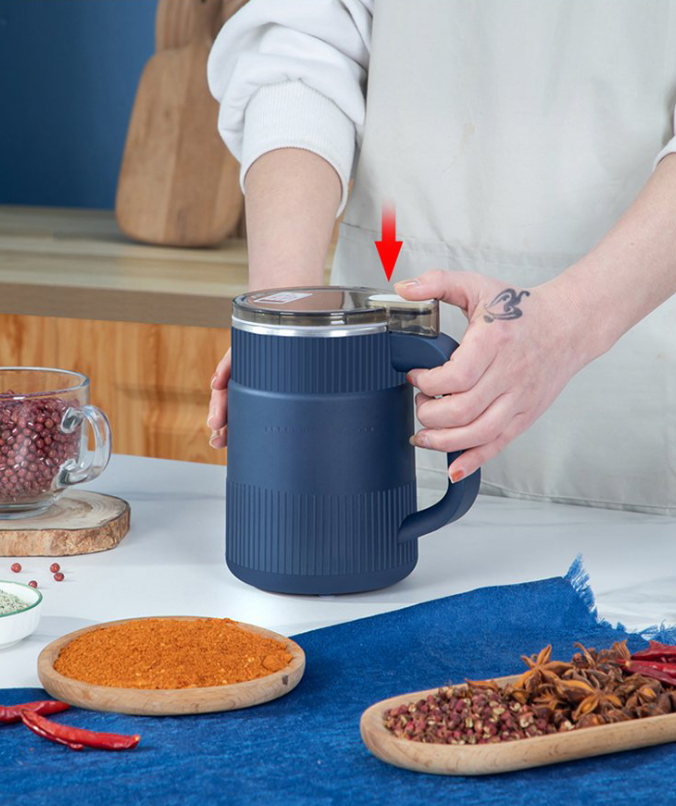 "Leistungsstarke Getreidemühle aus Edelstahl, mahlt Körner zu feinem Mehl, mit modernem Design, ideal für die Küche."